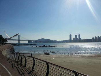 View of suspension bridge over sea