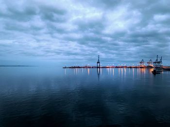 Pier over sea against sky