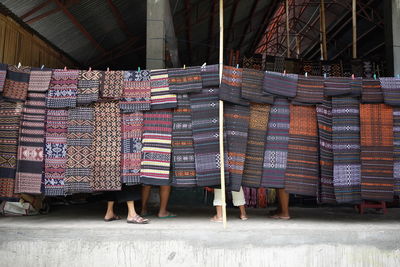 Stack of multi colored for sale at market stall