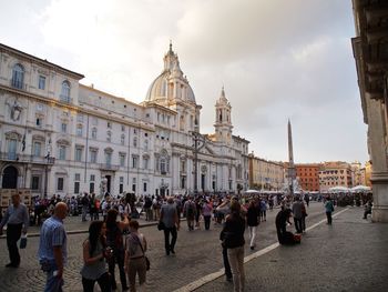 Tourists in front of building