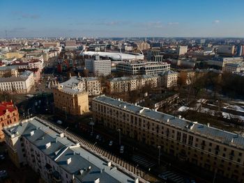 High angle view of buildings in city against sky