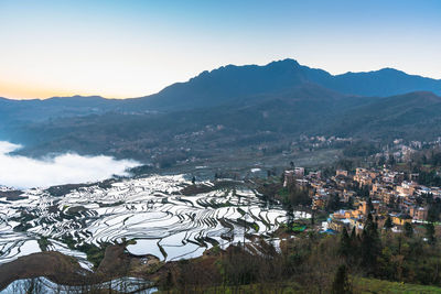 High angle view of buildings against sky