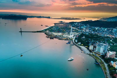 High angle view of sea against sky during sunset