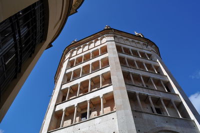 Low angle view of historcl building against clear blue sky