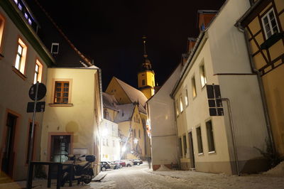 View of illuminated buildings at night