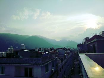 High angle view of illuminated cityscape against sky