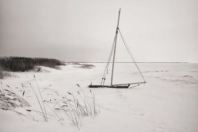 Scenic view of sea against sky during winter