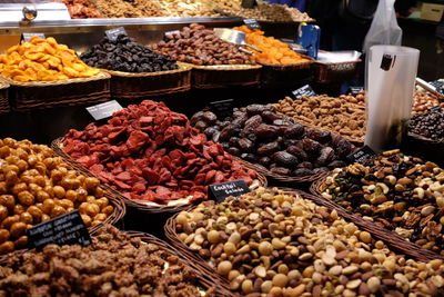 Dried fruits for sale at market stall