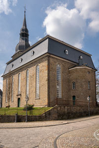 Exterior of historic building against sky