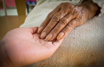 Close-up of woman hand with tattoo on hands