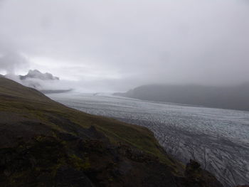 Scenic view of glacier landscape against sky