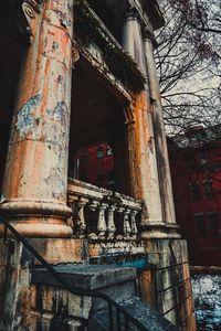 Low angle view of old abandoned building