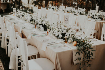 Panoramic view of white and people on table