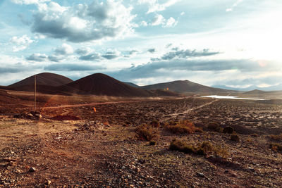 Scenic view of desert against sky