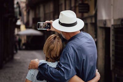 Rear view of woman wearing hat