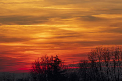 Scenic view of dramatic sky during sunset