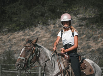 Girl is riding horse