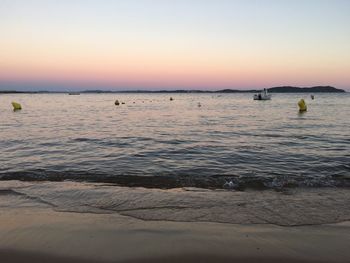 Scenic view of sea against clear sky