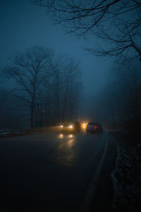 Cars on road at night during winter