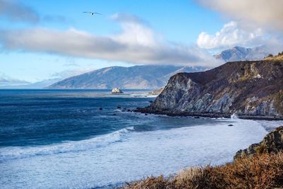 Scenic view of sea and mountains