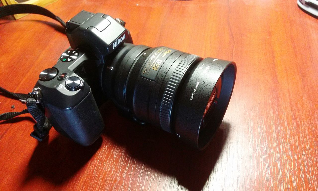 indoors, close-up, technology, still life, high angle view, equipment, metal, music, old-fashioned, retro styled, connection, part of, black color, musical instrument, single object, no people, machinery, selective focus, work tool, arts culture and entertainment