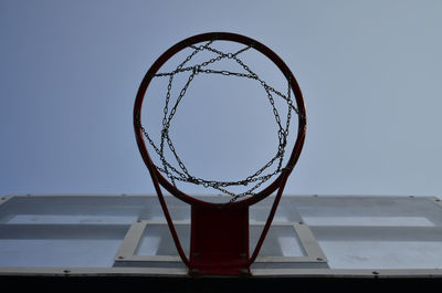 Close-up of basketball hoop against clear sky