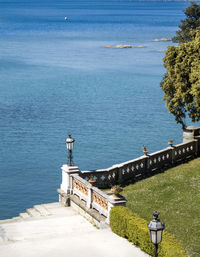 High angle view of sea against blue sky