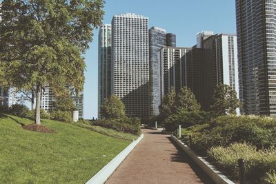 Skyscrapers in city against clear sky