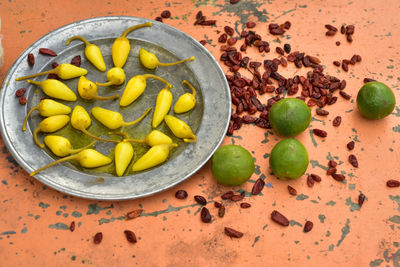 High angle view of chili pepper in plate on table