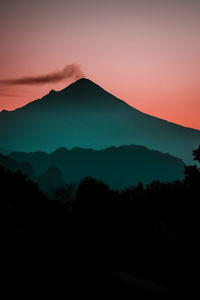 Scenic view of mountains against sky during sunset