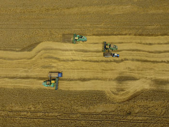 High angle view of trucks on field