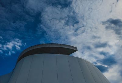 Low angle view of tower against blue sky