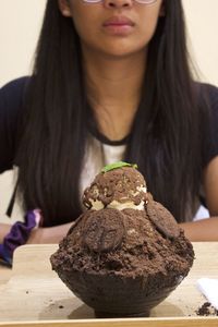 Close-up of woman eating food