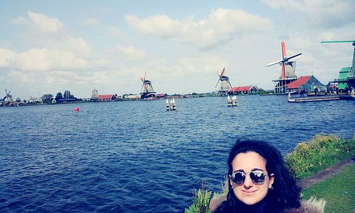 Portrait of boy by sunglasses against sky