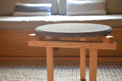 Designer side or center coffee table, top in natural stone, volcanic stone, quarry or terrazz