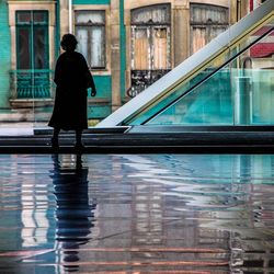 Full length of woman walking in city