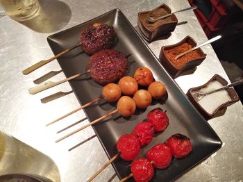High angle view of apples in container on table