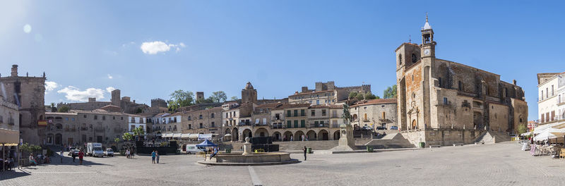 Buildings in city against sky