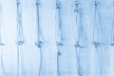 Low angle view of cables against sky
