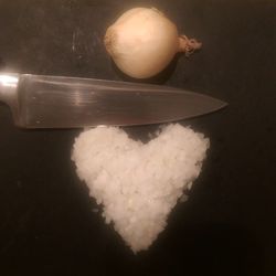 Close-up of white candle on white background