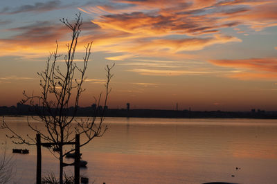 Scenic view of sea at sunset