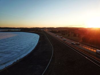 Panoramic view of city against clear sky during sunset