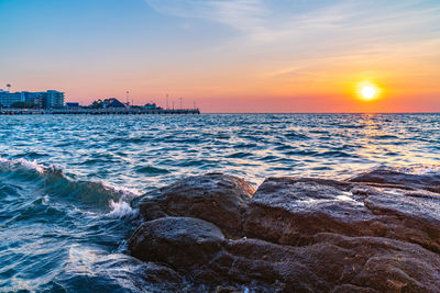 Scenic view of sea against sky during sunset