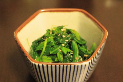 High angle view of boiled spinach in bowl on table