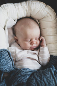 High angle view of baby sleeping