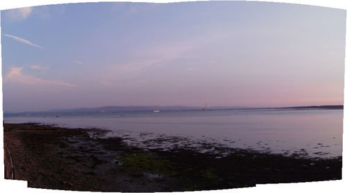 Scenic view of sea at sunset