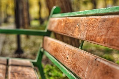 Close-up of rusty metal bench
