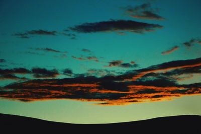 Low angle view of dramatic sky during sunset