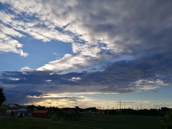 Scenic view of landscape against sky during sunset