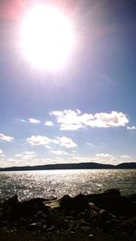 Sun shining over sea